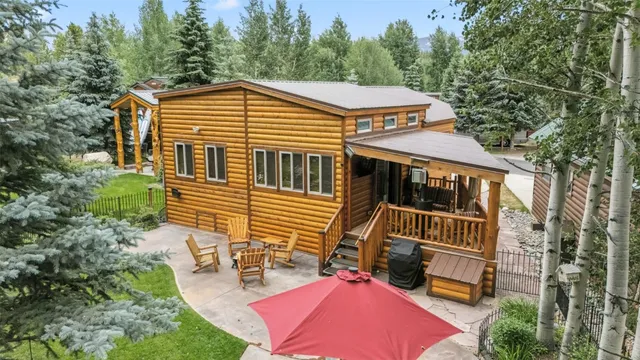 a backyard of a house with seating space
