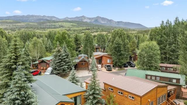 a view of a patio with a table and chairs
