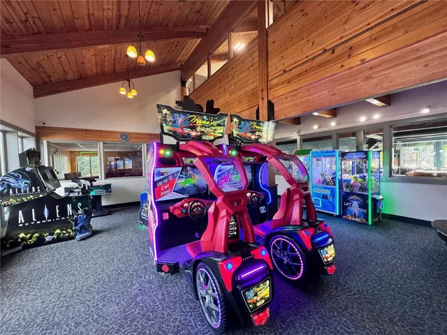 a living room with lots of furniture and a flat screen tv