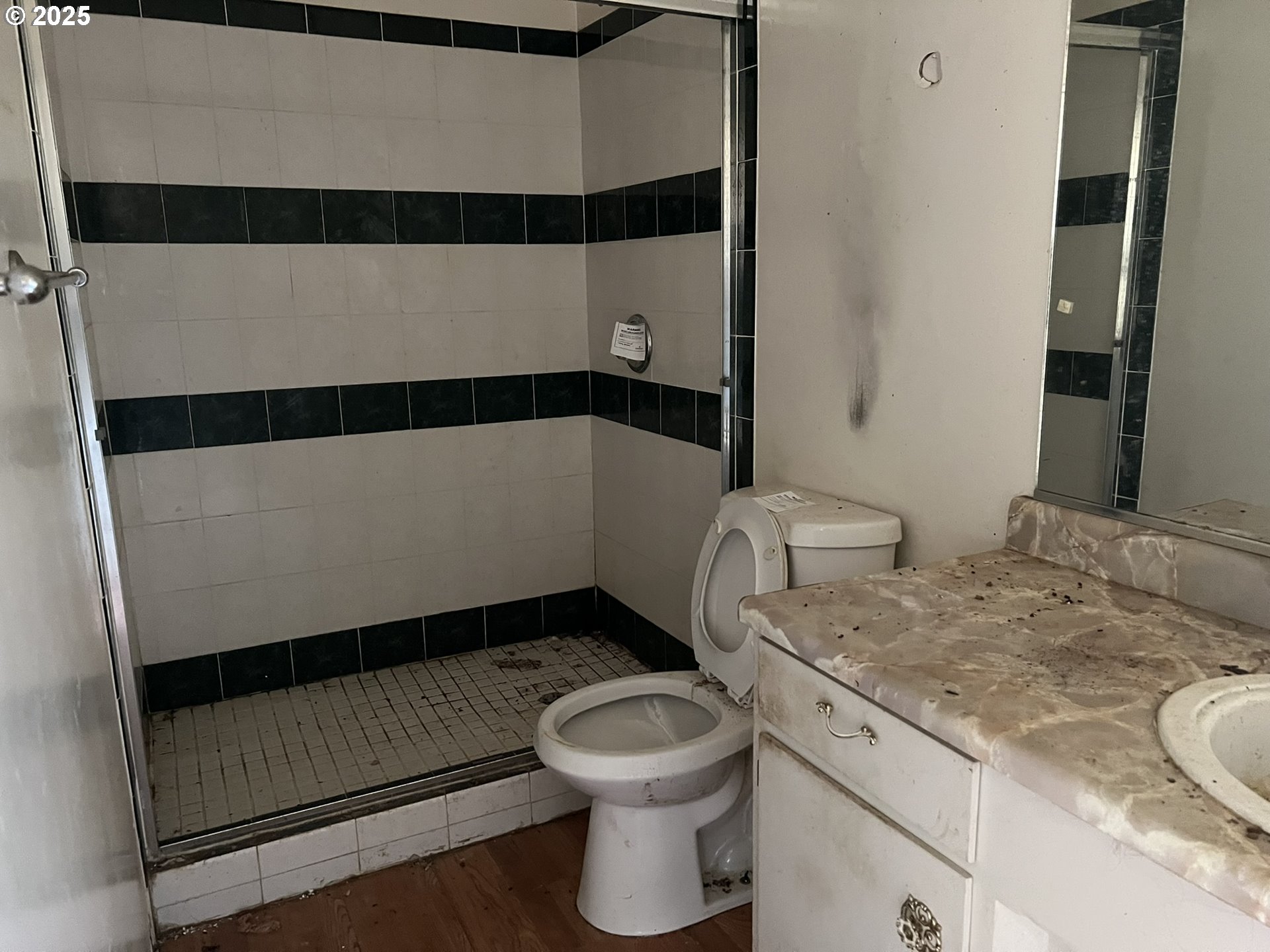 1032 Marina Heights Road Brookings, OR 97415 - Photo 28 of 43 a bathroom with a sink toilet and shower