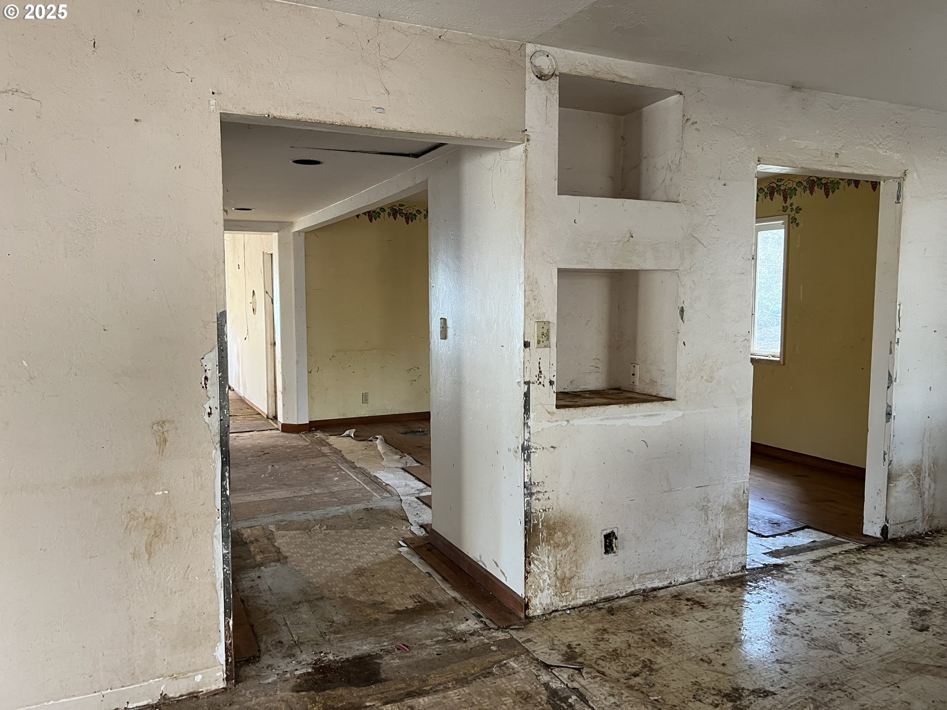 1032 Marina Heights Road Brookings, OR 97415 - Photo 8 of 43 a view of a hallway with wooden cabinets