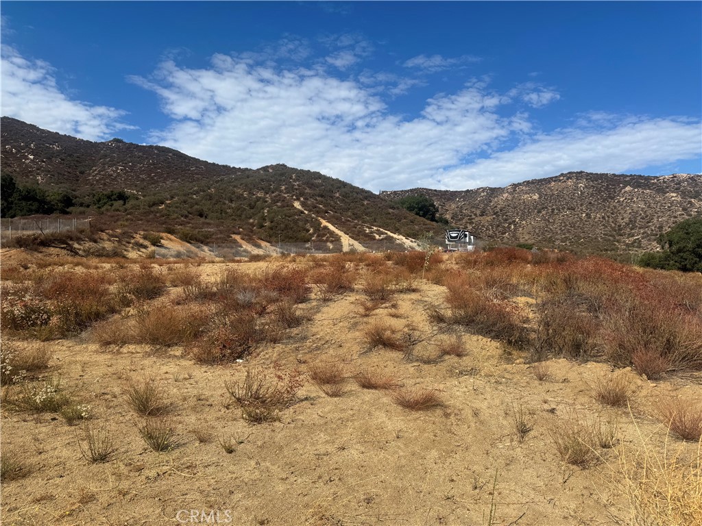 a view of mountain with sunset