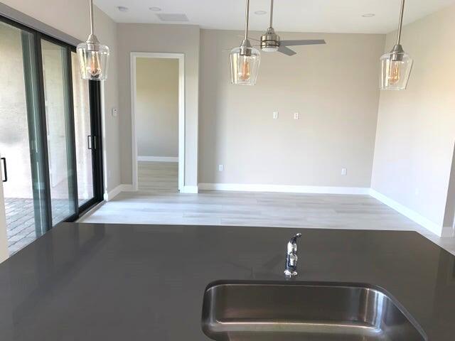14161 Rock Salt Road Delray Beach, FL 33446 - Photo 12 of 33 Rock Salt from kitchen to Living and roo