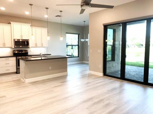 14161 Rock Salt Road Delray Beach, FL 33446 - Photo 5 of 33 Rock Salt Kitchen from the Living Area