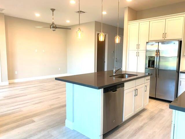 14161 Rock Salt Road Delray Beach, FL 33446 - Photo 9 of 33 Rock Salt Kitchen to Living Area