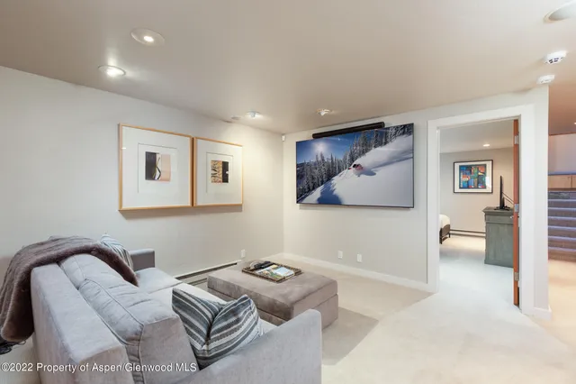 a bedroom with furniture and window