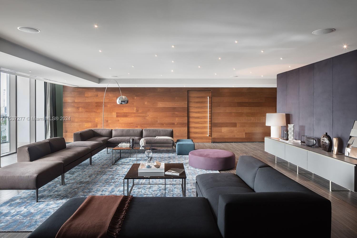 88 Southwest 7th Street, Unit 4001 Miami, FL 33130 - Photo 31 of 42 a living room with furniture and a large window