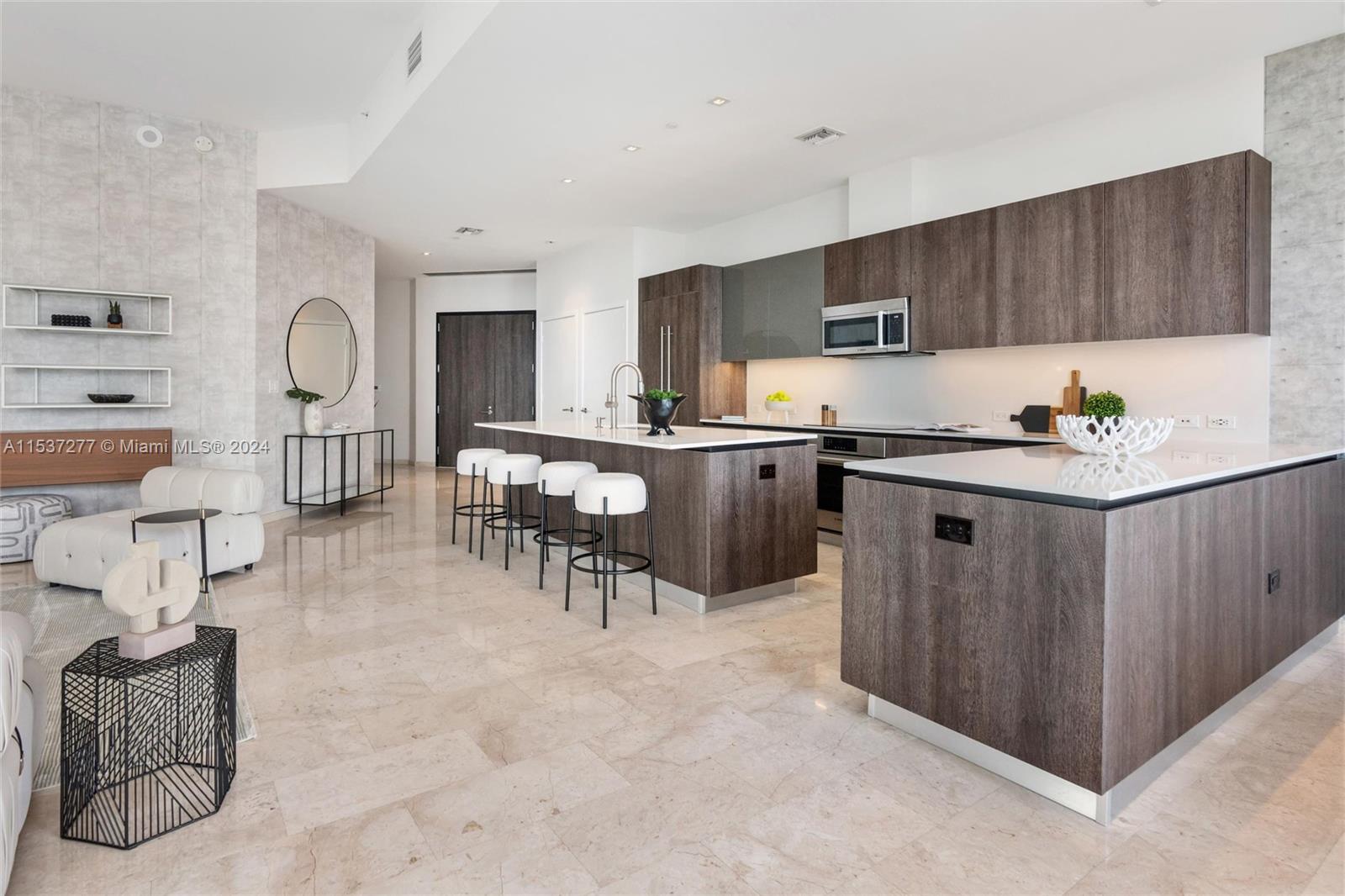 88 Southwest 7th Street, Unit 4001 Miami, FL 33130 - Photo 8 of 42 a kitchen with a sink cabinets and window