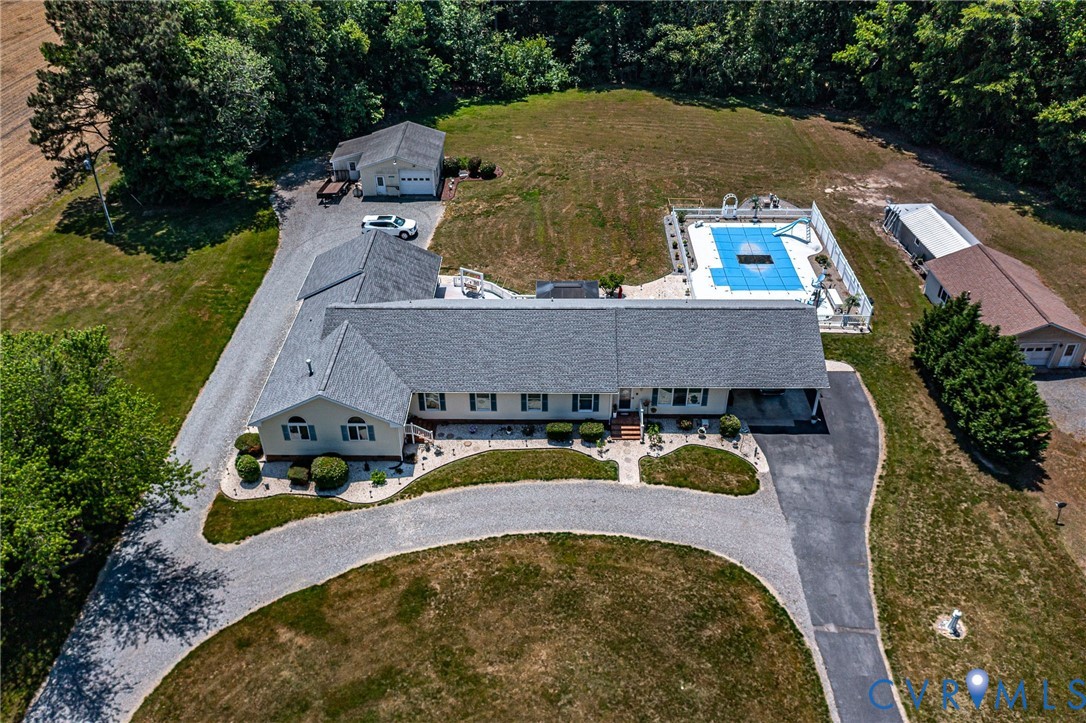 4400 Hacks Neck Road Heathsville, VA 22473 - Photo 49 of 78 an aerial view of a house with swimming pool and trees