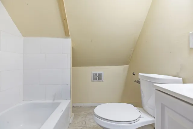a bathroom with a sink a toilet