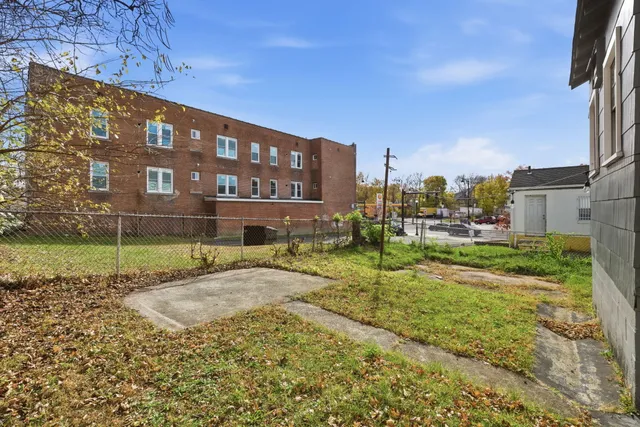 a backyard of a house with lots of green space