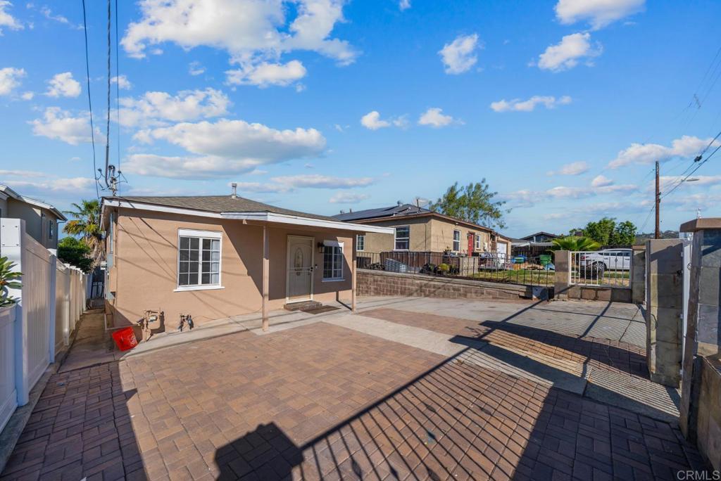 724 Felicita Avenue Spring Valley, CA 91977 - Photo 19 of 37 a front view of a house with yard and balcony