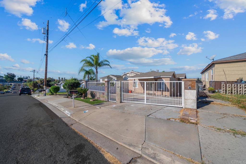 724 Felicita Avenue Spring Valley, CA 91977 - Photo 28 of 37 a view of a street with a building in the background