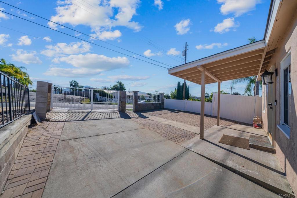 724 Felicita Avenue Spring Valley, CA 91977 - Photo 3 of 37 a patio with table and chairs