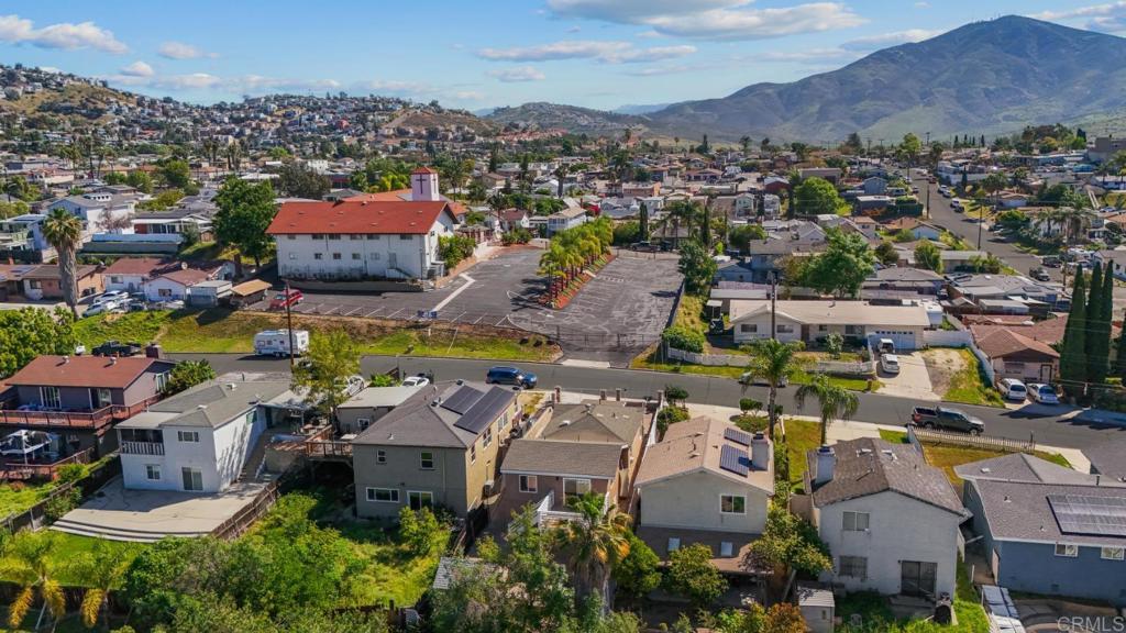 724 Felicita Avenue Spring Valley, CA 91977 - Photo 36 of 37 an aerial view of a houses with a swimming pool