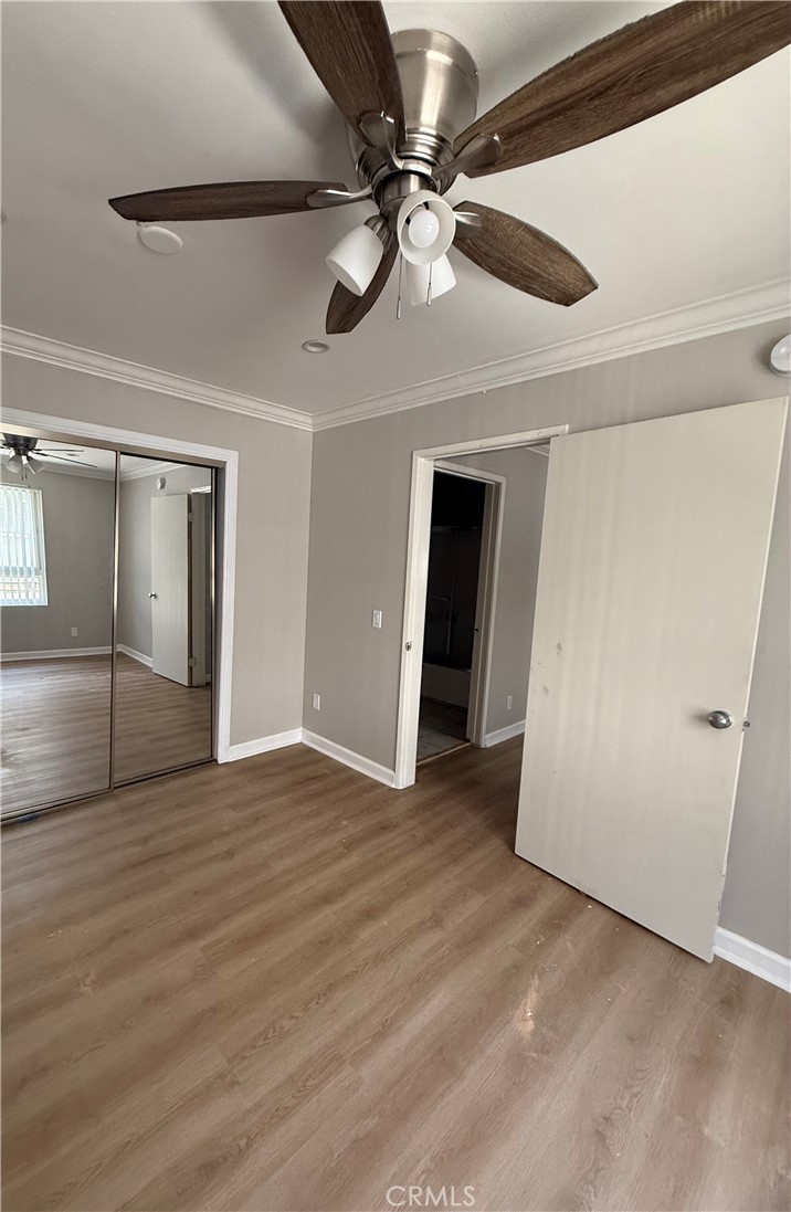 10900 Blix Street, Unit 4 North Hollywood, CA 91602 - Photo 4 of 10 a view of an empty room with a ceiling fan