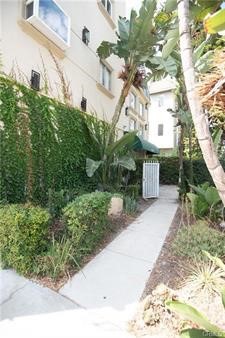 10900 Blix Street, Unit 4 North Hollywood, CA 91602 - Photo 6 of 10 a view of a house with a yard and plants