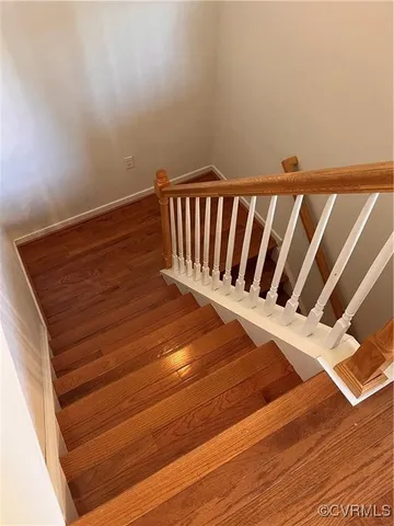 a house with swimming pool in front of it