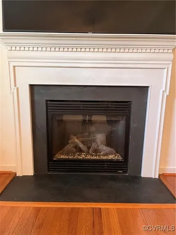 a bathroom with a granite countertop sink a mirror and a shower