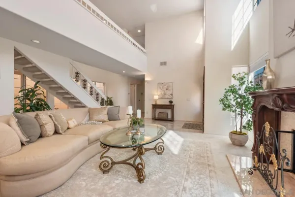 a kitchen with stainless steel appliances granite countertop a refrigerator sink and cabinets
