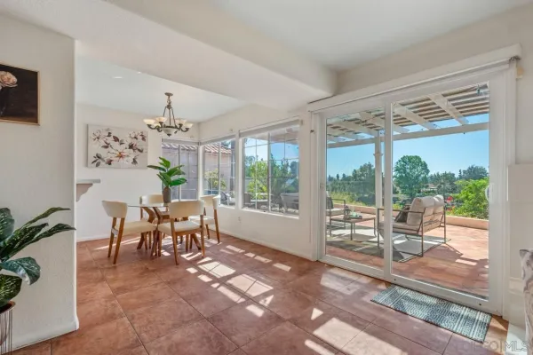 a view of a room with wooden floor and couch