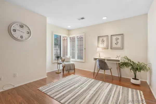 a bathroom with a tub a sink and a shower