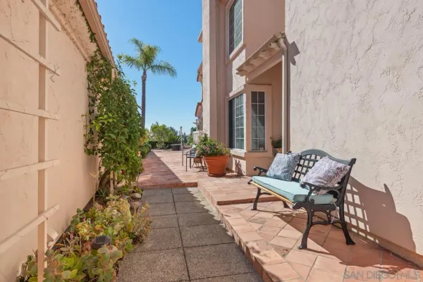 a house with a potted plant in front of it