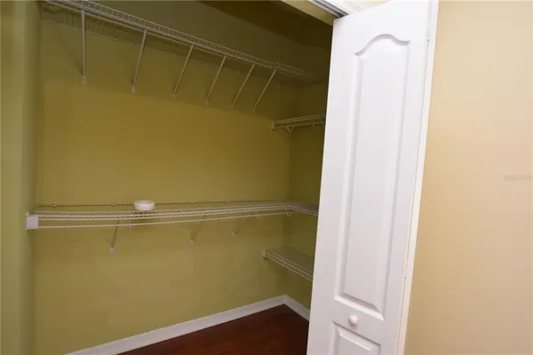 a view of a room with racks on the wall