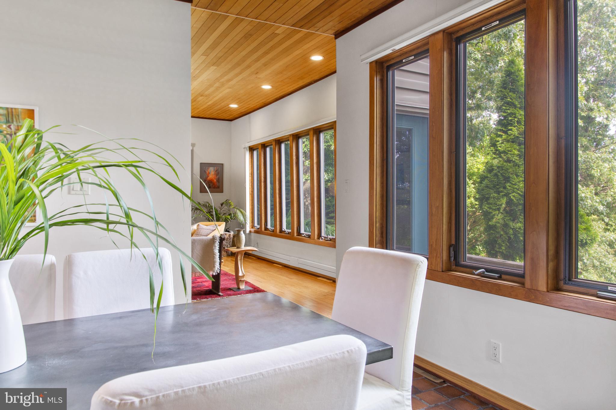 1646 Hilltop Road Spring City, PA 19475 - Photo 11 of 48 Wall of LR and DR windows showcasing amazing view
