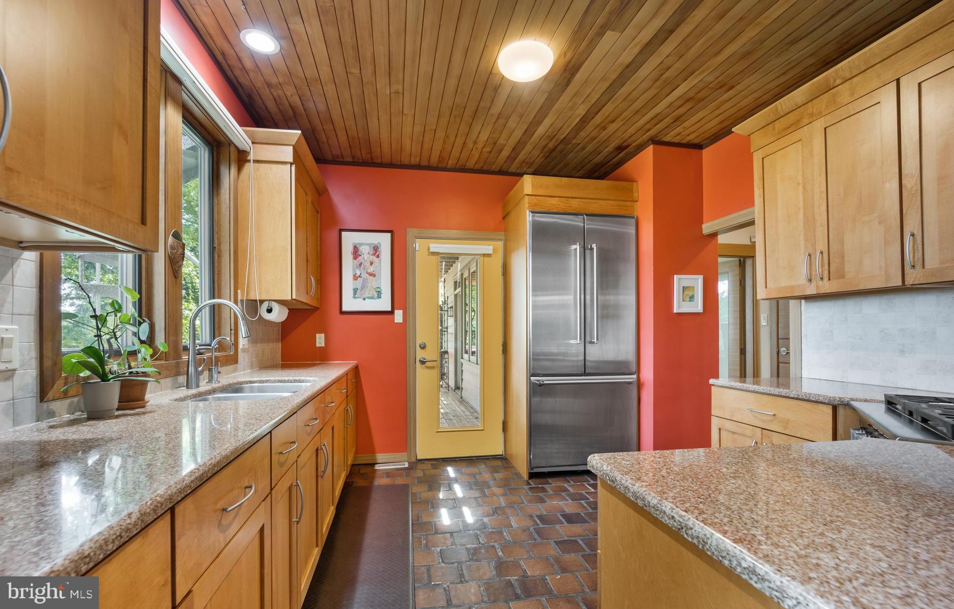 1646 Hilltop Road Spring City, PA 19475 - Photo 14 of 48 Kitchen with egress to deck