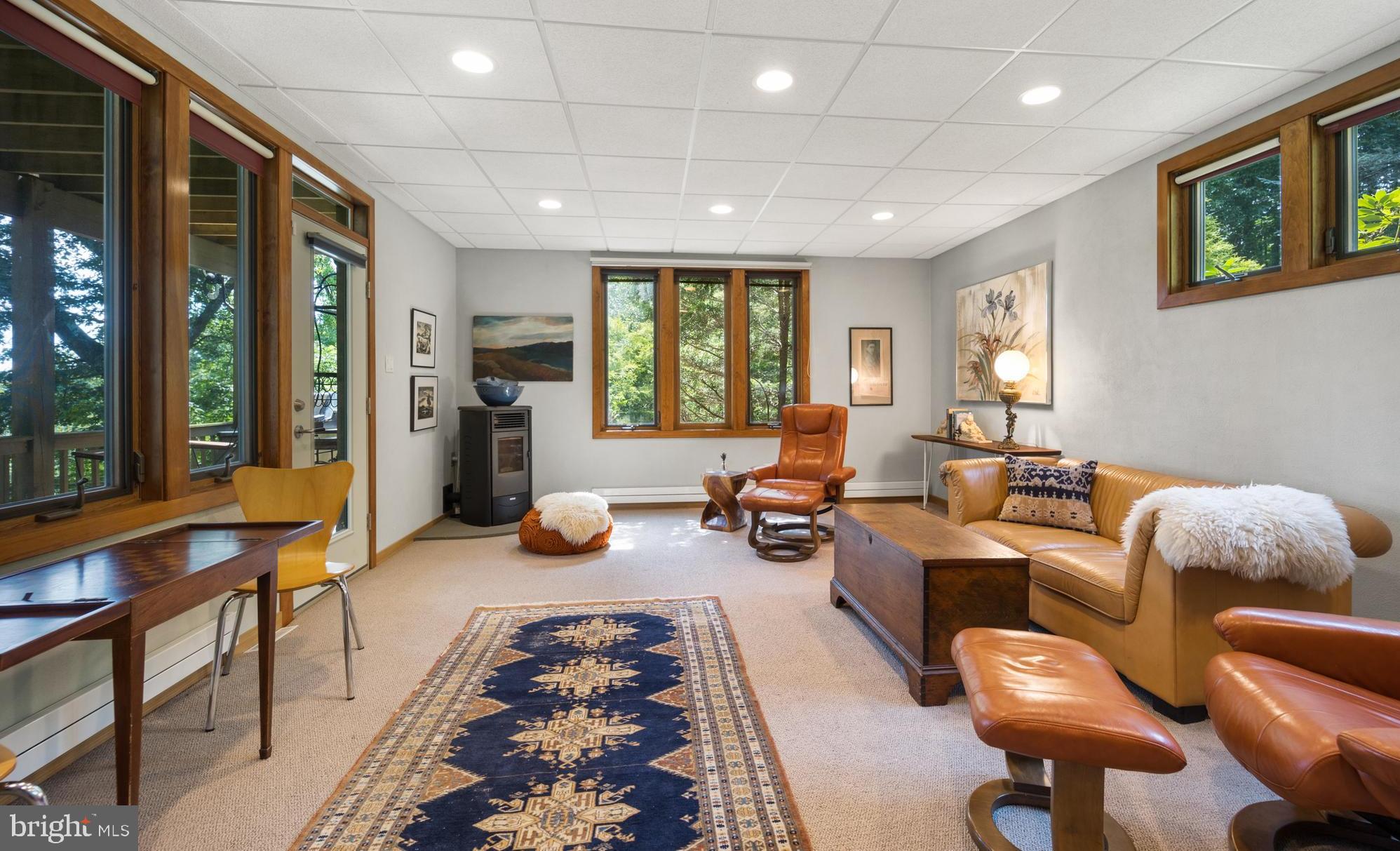 1646 Hilltop Road Spring City, PA 19475 - Photo 22 of 48 Family room with pellet stove