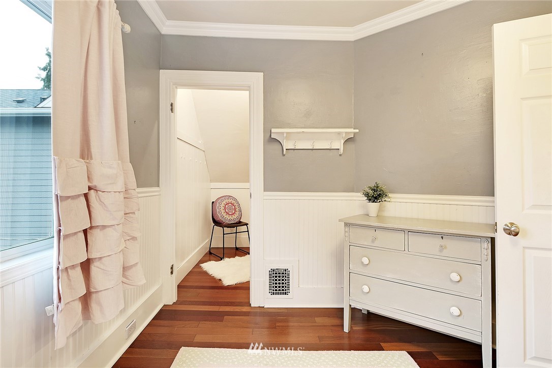 1936 47th Avenue Southwest Seattle, WA 98116 - Photo 15 of 25 a bathroom with a sink and mirror