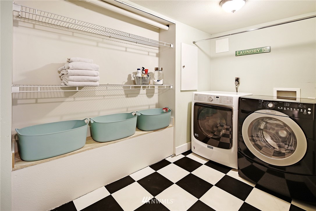 1936 47th Avenue Southwest Seattle, WA 98116 - Photo 21 of 25 a utility room with sink dryer and washer