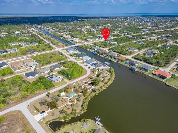 a view of a hallway with a chandelier