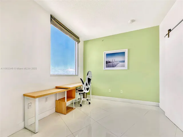 a view of a room with shelves