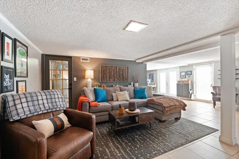 a living room with furniture and a couch