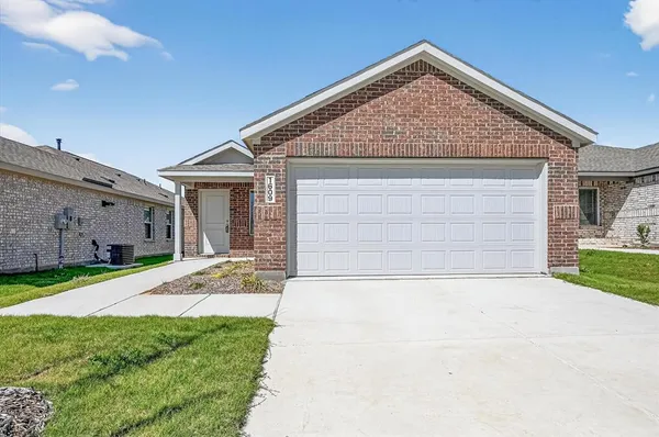 a front view of house with yard