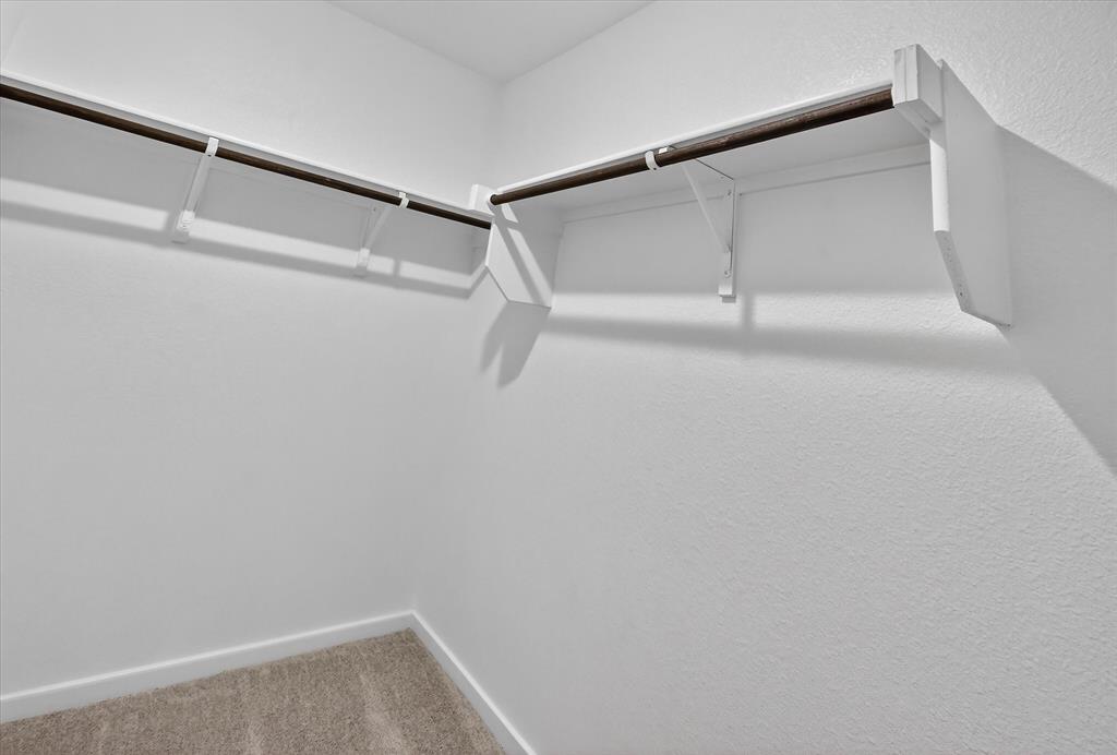 1609 Elliott Road Howe, TX 75459 - Photo 14 of 24 a view of an empty walk in closet