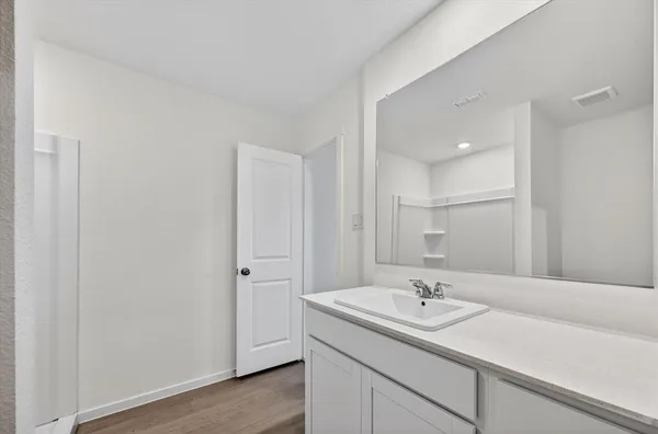 a bathroom with a sink and a toilet