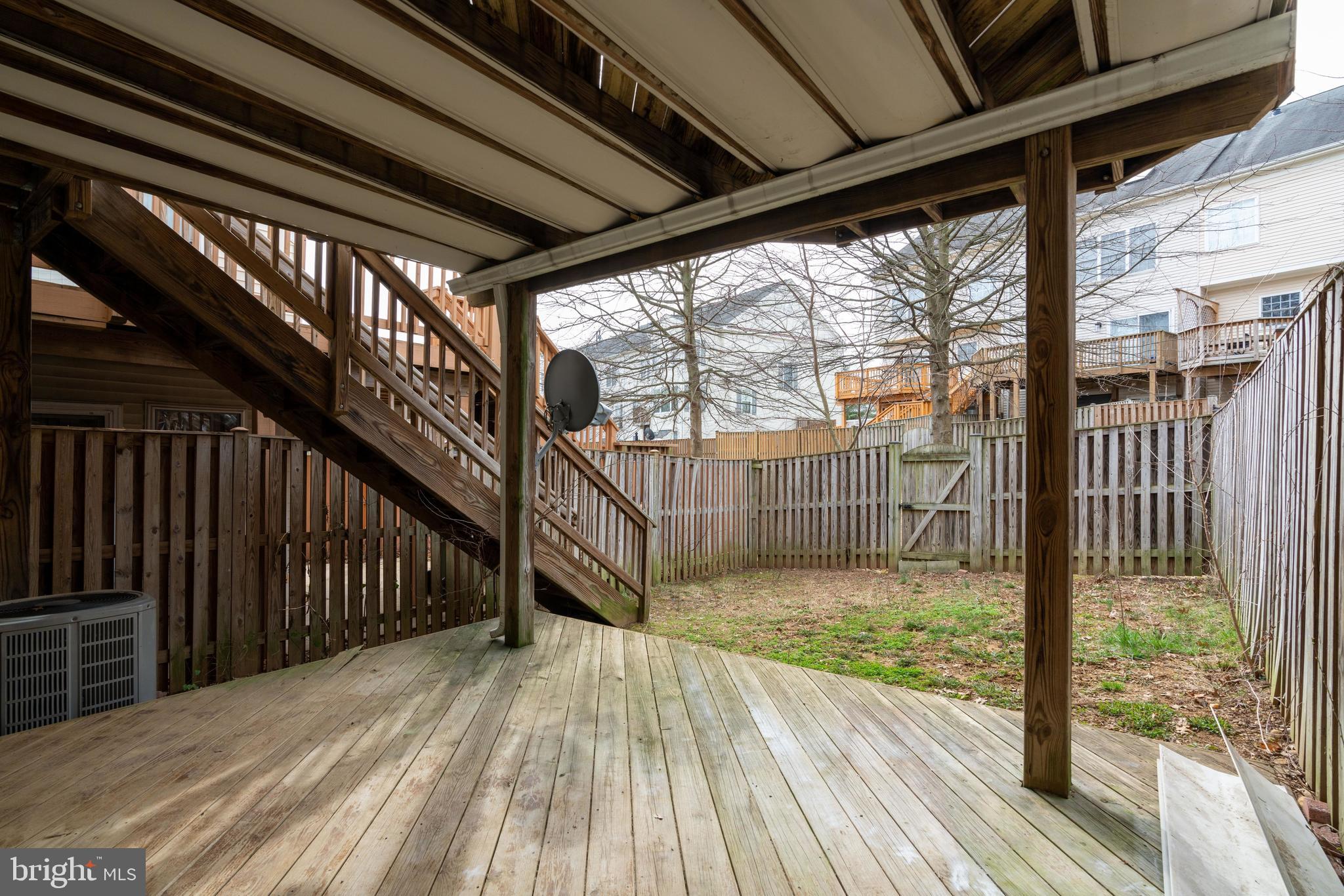 9058 Two Bays Road Lorton, VA 22079 - Photo 37 of 42 Lower Level Deck and fenced in backyard