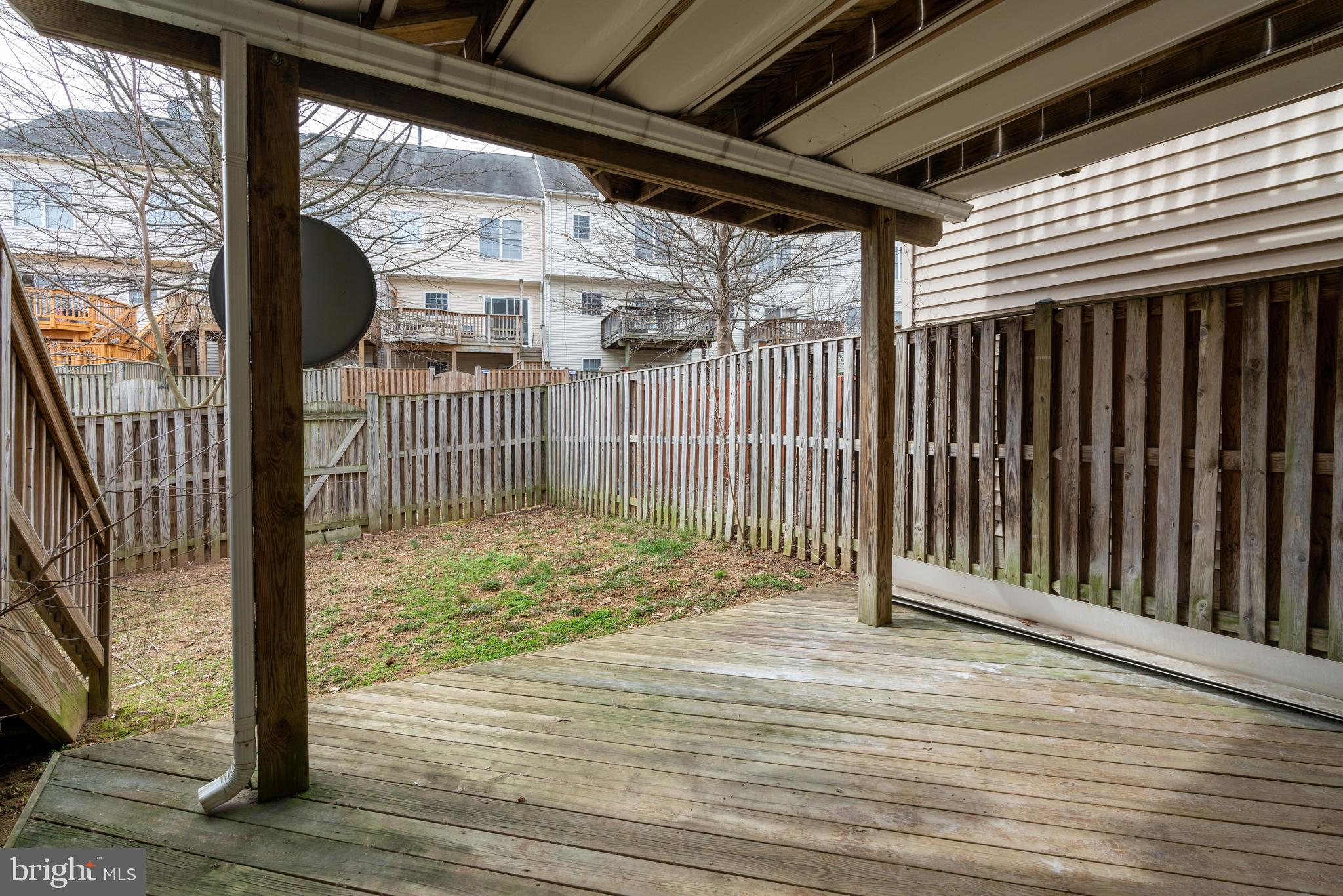 9058 Two Bays Road Lorton, VA 22079 - Photo 38 of 42 Lower Level Deck and fenced in backyard