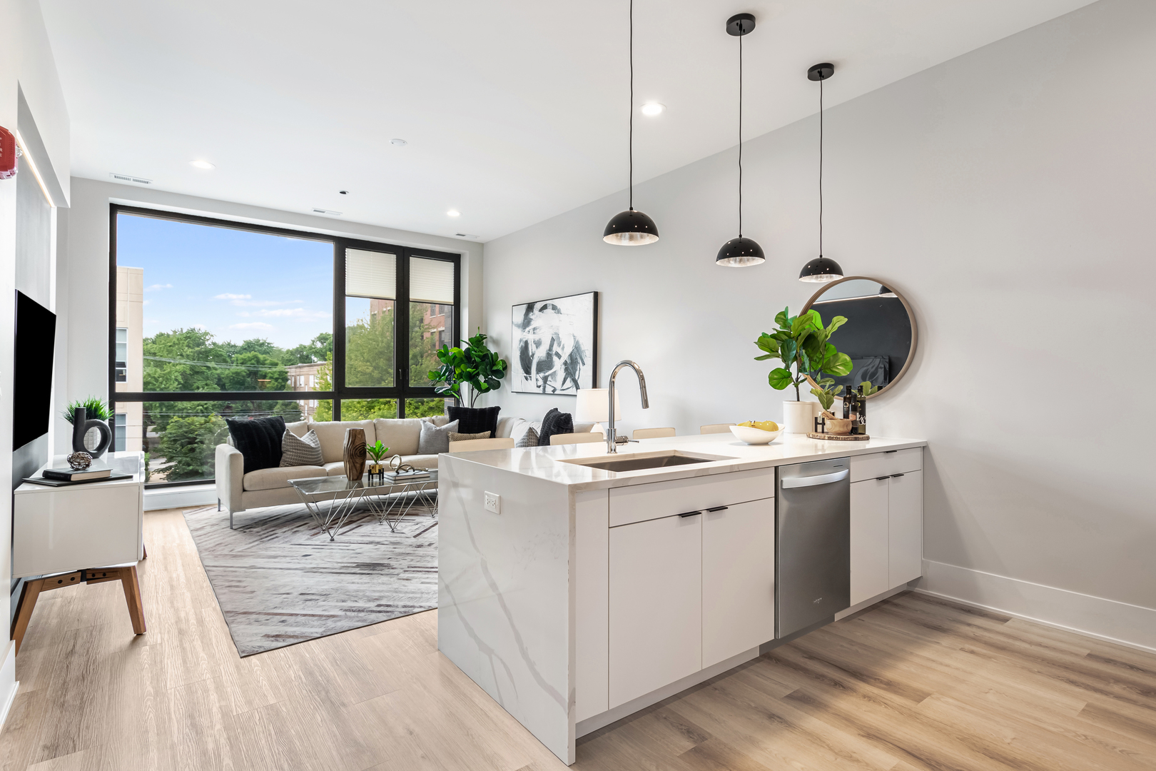 Undisclosed Address Chicago, IL 60660 - Photo 3 of 18 a view of living room with a sink and floor to ceiling window