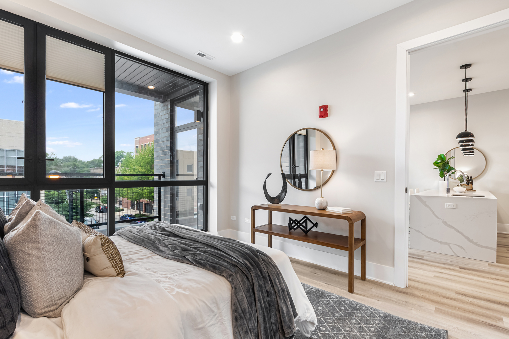 Undisclosed Address Chicago, IL 60660 - Photo 8 of 18 a bedroom with bed and a large window