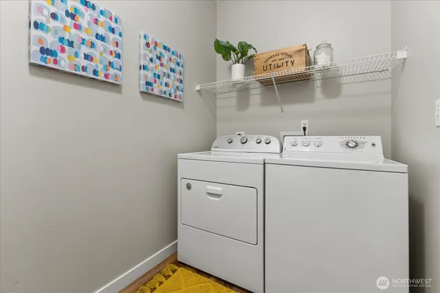 a utility room with dryer and washer