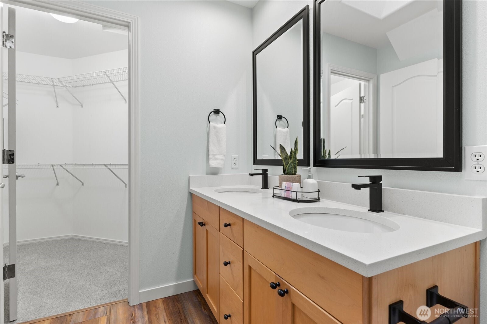 16526 Southeast 256th Street, Unit C3 Covington, WA 98042 - Photo 14 of 26 a bathroom with a sink and a mirror