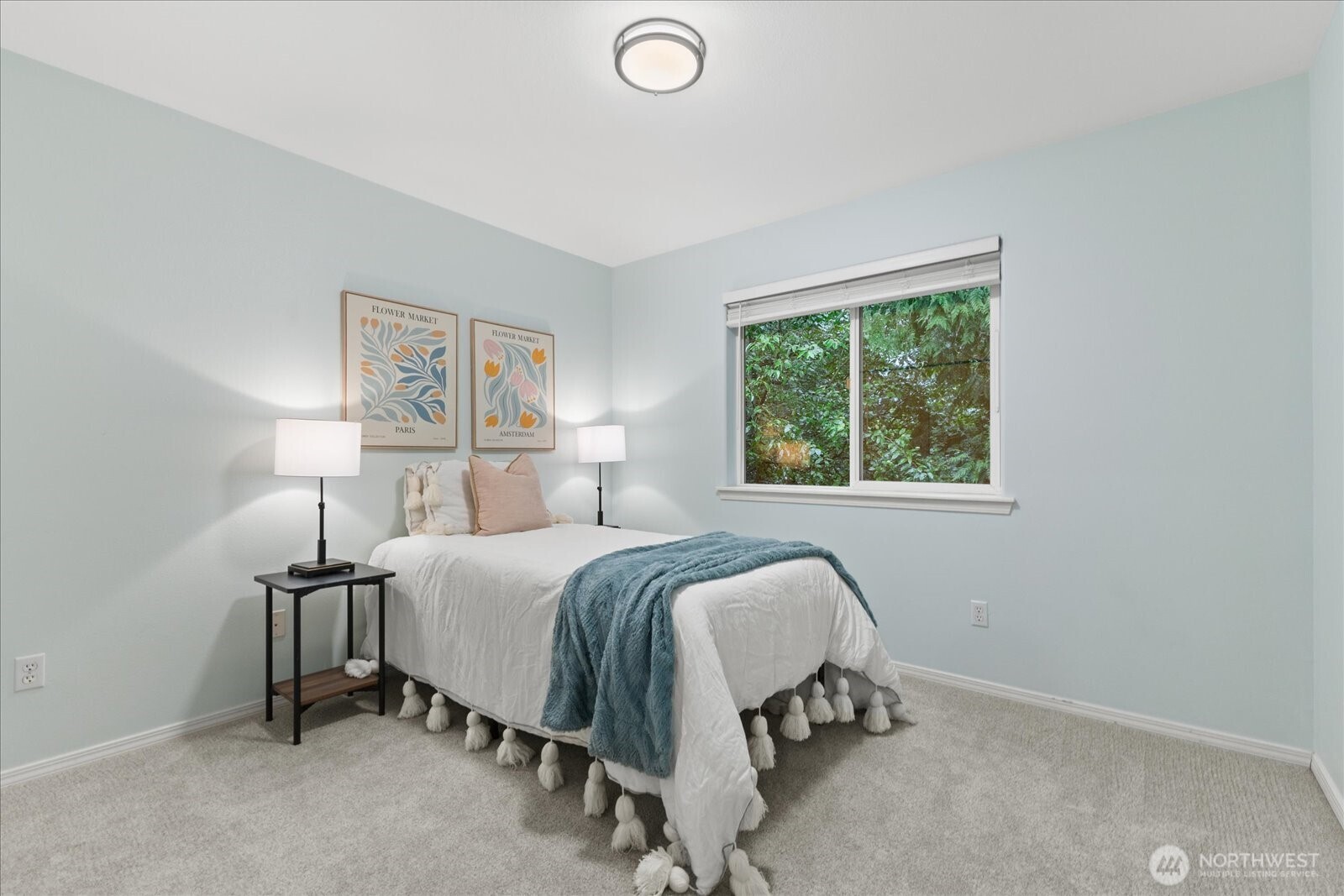 16526 Southeast 256th Street, Unit C3 Covington, WA 98042 - Photo 18 of 26 a bedroom with a bed and a window