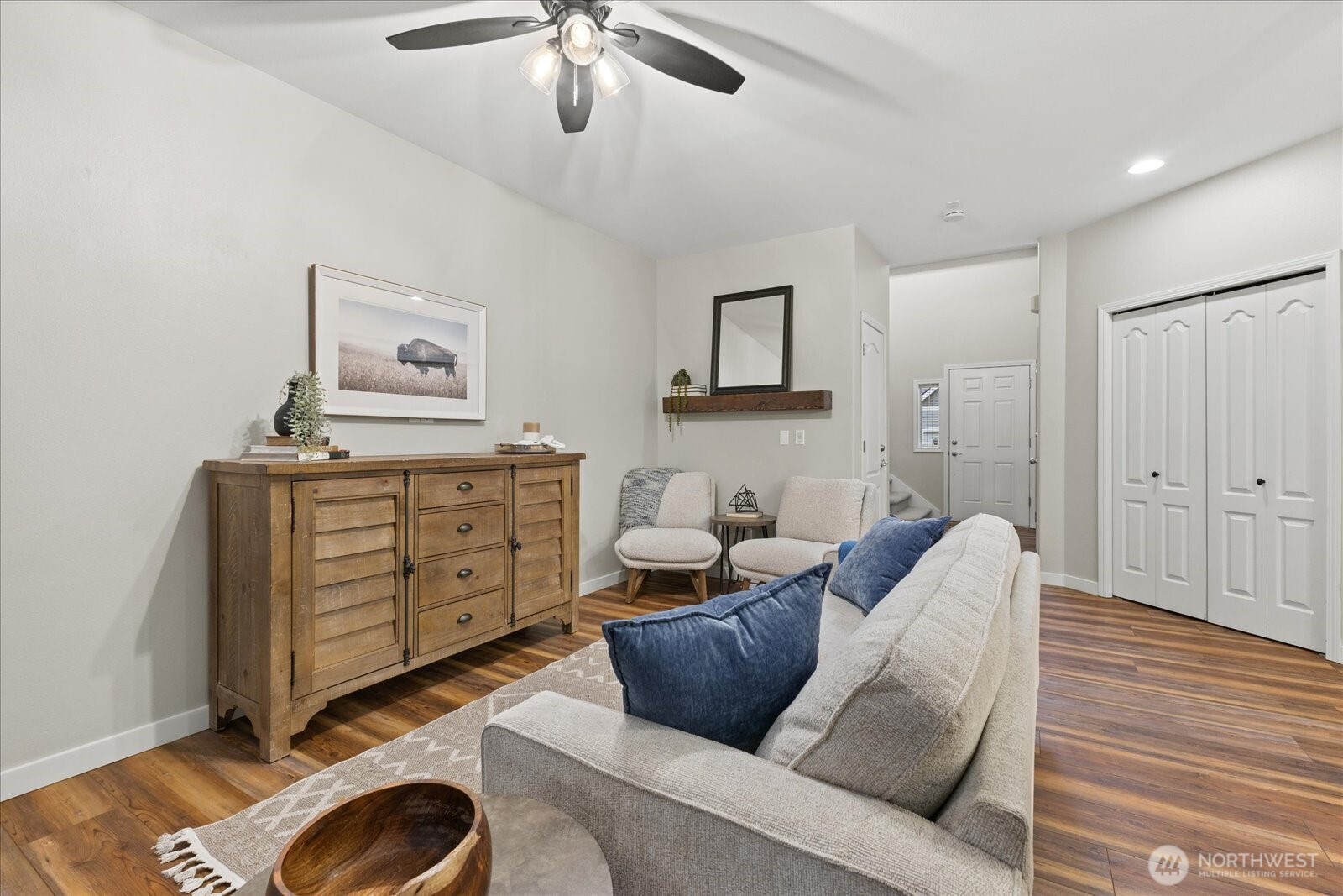 16526 Southeast 256th Street, Unit C3 Covington, WA 98042 - Photo 4 of 26 a living room with furniture and a wooden floor
