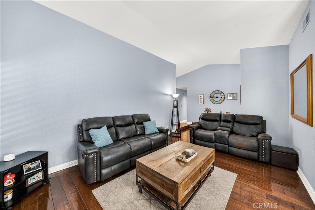 4040 Penrod Drive Riverside, CA 92505 - Photo 8 of 30 a living room with furniture and a wooden floor