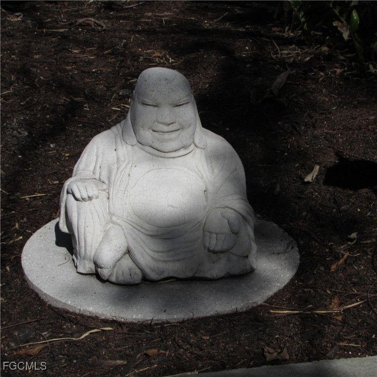 16111 Tortuga Street Bokeelia, FL 33922 - Photo 19 of 29 a close view of a fountain