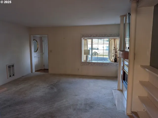 an empty room with windows